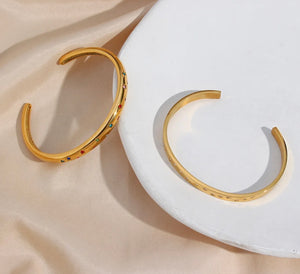Cosmic gold torque bracelets
