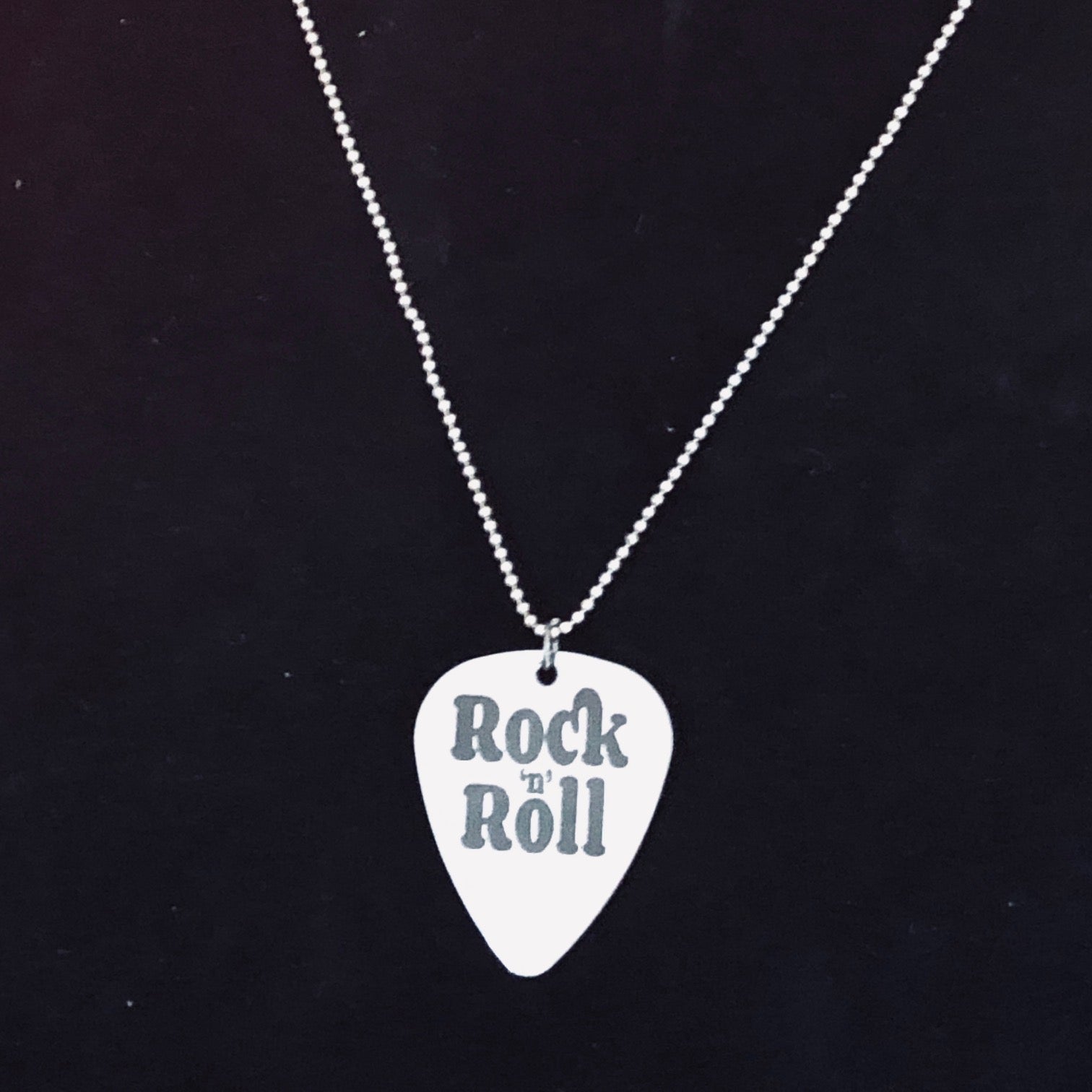 Rock 'n' Roll Guitar pick necklace.